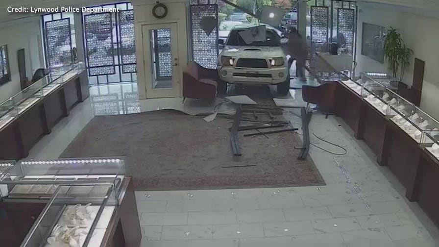 Washington jewelry store owner opens fire after would-be thieves ram truck through storefront