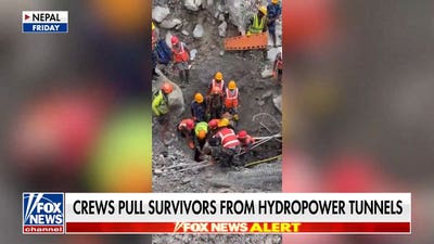 Rescue crews pull survivors from hydropower tunnels after deadly Nepal flood