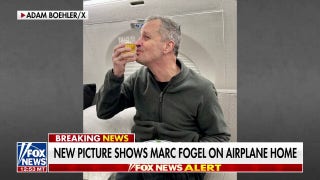 New pic shows freed American hostage Marc Fogel on plane home - Fox News
