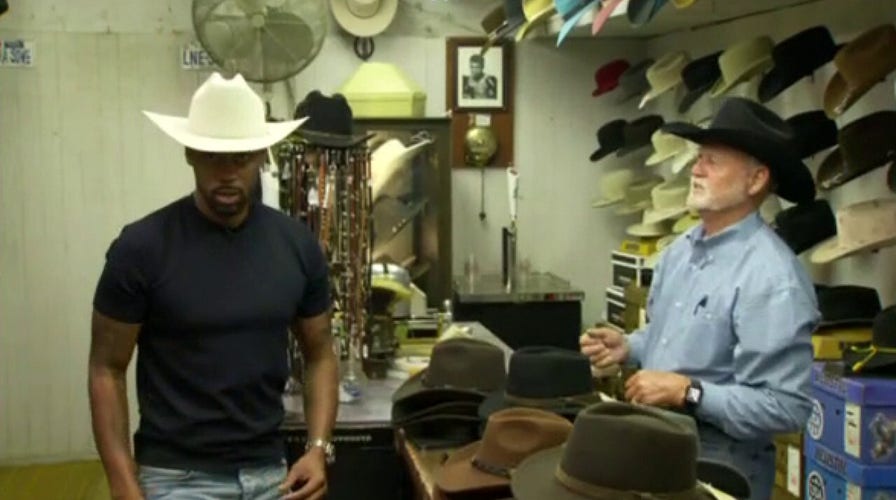 Lawrence Jones finds his perfect cowboy hat at the Texas State Fair