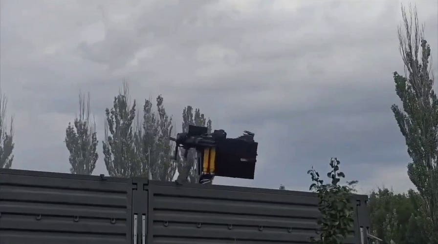 Russian soldier sent flying as Soviet-era helicopter gun spins out of control