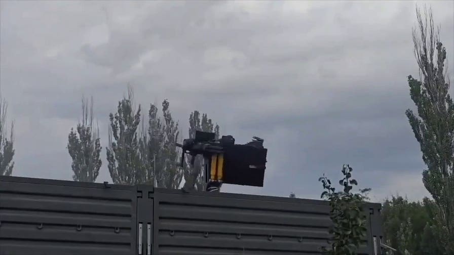 Russian soldier sent flying as Soviet-era helicopter gun spins out of control