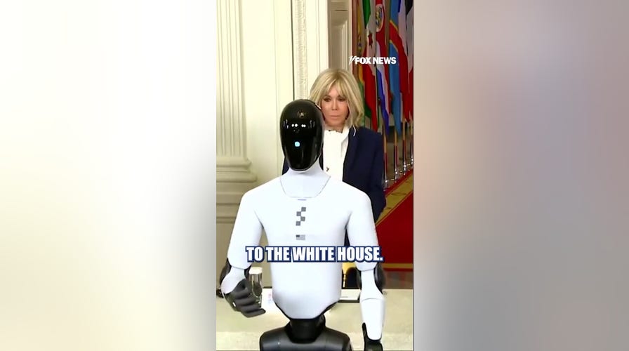 Melania Trump enters tech summit alongside humanoid robot