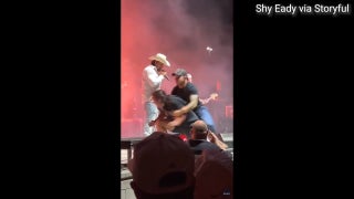 Man tackled by security after rushing towards Gavin Adcock during concert