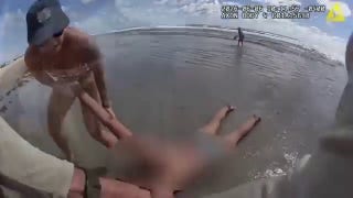 Deputies' dramatic rescue of woman from ocean caught on camera