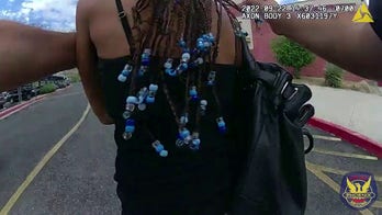 Phoenix police stop woman as she pulls out gun at school