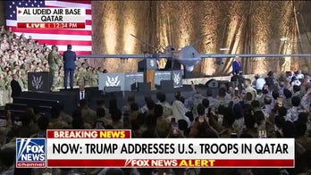 Trump enters Al Udeid Air Base in Qatar to live performance of 'God Bless the USA'
