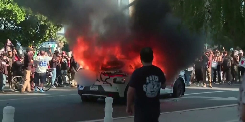 ICE protesters in Los Angeles torch police vehicles