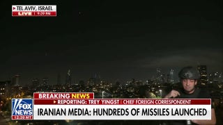 Tensions rise as Iran launches hundreds of missiles into Israel