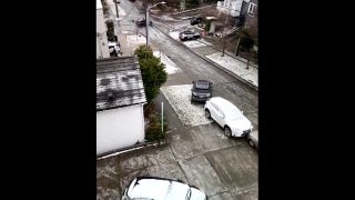 Watch as cars slide down street and collide with one another in Seattle - Fox News