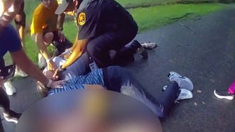 Police bodycam captures frantic rescue after couple struck by lightning