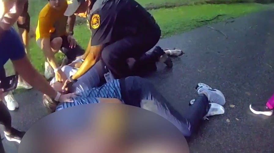 Police bodycam captures frantic rescue after couple struck by lightning