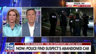 Officers surround building after finding Brown suspect’s abandoned car, report says