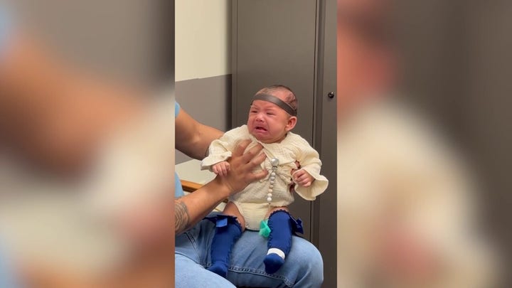 Baby hears dad's voice for the first time — bursts into tears