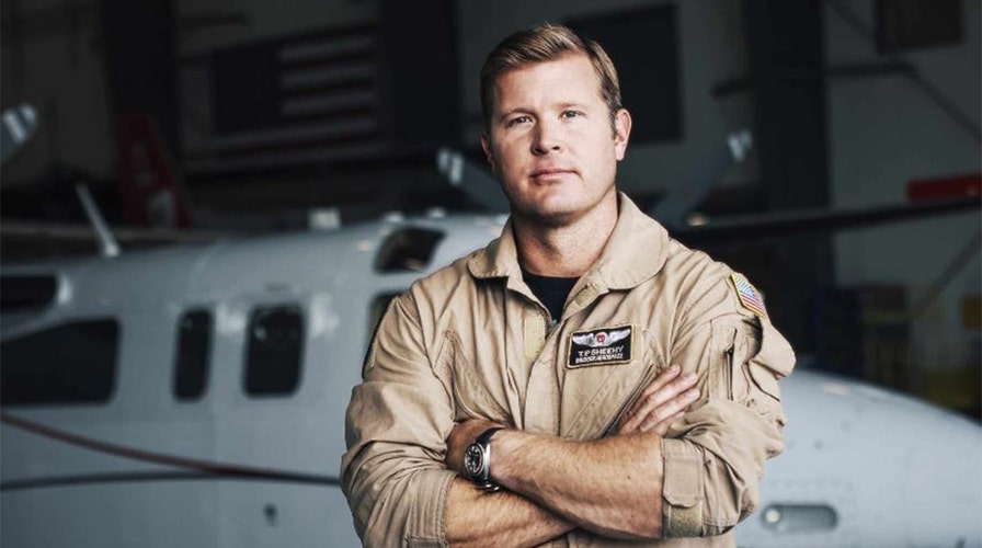 Former Navy SEAL seeking to oust three-term Democratic senator builds momentum with more big-name support