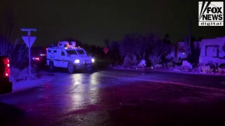 SWAT vehicle seen leaving scene of law enforcement operation miles from Guthrie home - Fox News