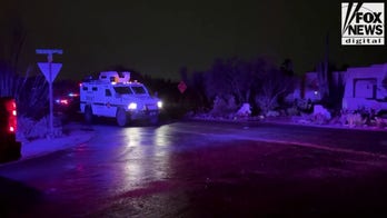 SWAT vehicle seen leaving scene of law enforcement operation miles from Guthrie home