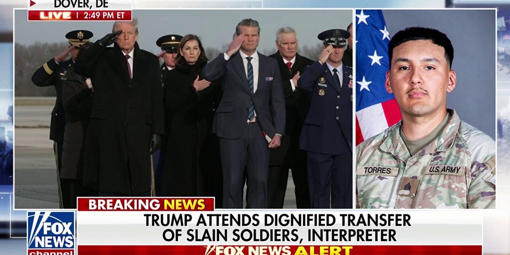 Trump, Iowa officials salute dignified transfer of slain soldiers and interpreter