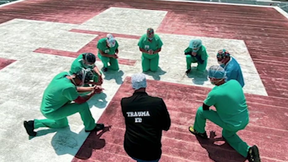 Nurses Gather To Pray On Rooftops During Coronavirus Pandemic | Fox News