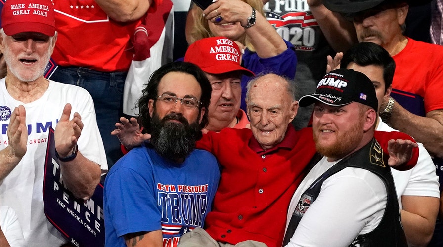 100-year old WWII Navy veteran carried to his seat by Trump supporters at rally