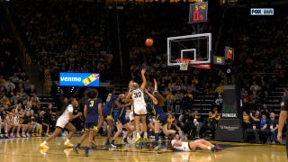 Callie Levin drives and sinks in floater as shot clock expires, extending Iowa's lead over Michigan