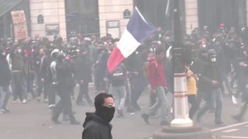 Protests turn violent in Paris over pension reforms