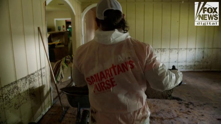 Samaritan's Purse volunteers bring faith to tragedy while helping clear out flood damage