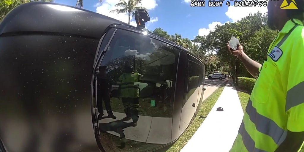 Authorities retrieve Tiger Woods' clubs from back windshield after crash