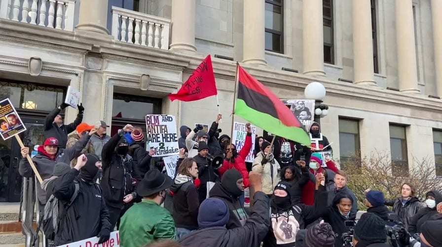 Protesters hold prayer, moment of silence outside Kenosha County Courthouse