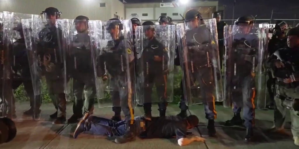 NJ state police corral agitators outside Delaney Hall detention center
