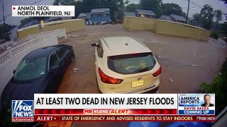 Flood waters sweep across New Jersey leaving 2 dead and millions affected