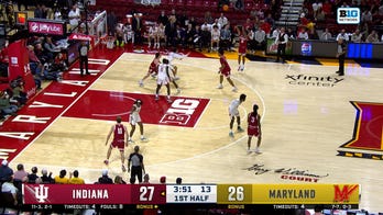 Tayton Conerway hits a 3-pointer, extending Indiana's lead over Maryland