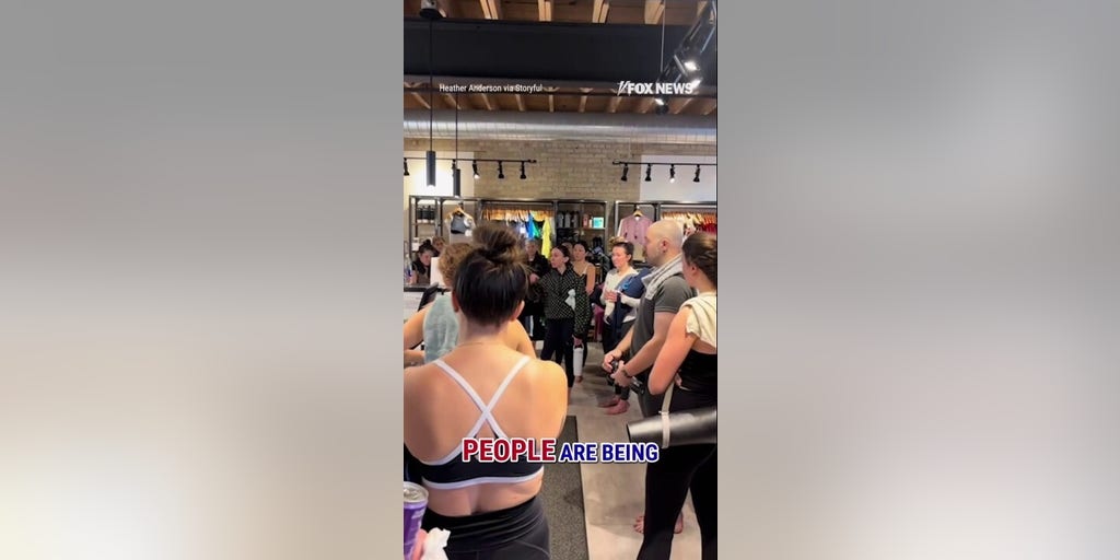 Protesters HECKLE yoga studio for lack of anti-ICE posters