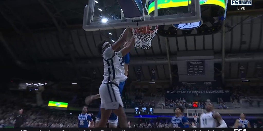Andre Screen throws down an alley-oop dunk, extending Butlers' lead over Seton Hall