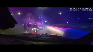 Illinois police officers save man from burning car wreck after highway crash, video shows