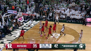 Coen Carr HAMMERS THREE consecutive fastbreak dunks, extending Michigan State's lead against Rutgers