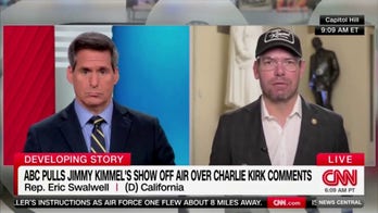 Eric Swalwell dons 'Jimmy Kimmel Live!' hat in solidarity for CNN interview