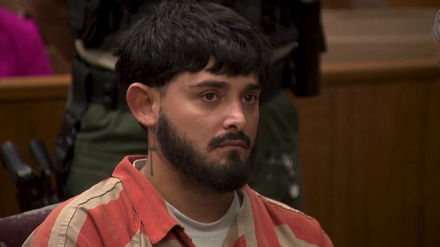 Accused killer of newborn, mother and grandmother appears unfazed in court