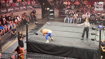 65-year-old Blue Panther hits crossbody splash on 54-year-old Último Guerrero