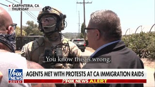 Protester screams ‘you know this is wrong’ at ICE agent conducting raid at California marijuana farm