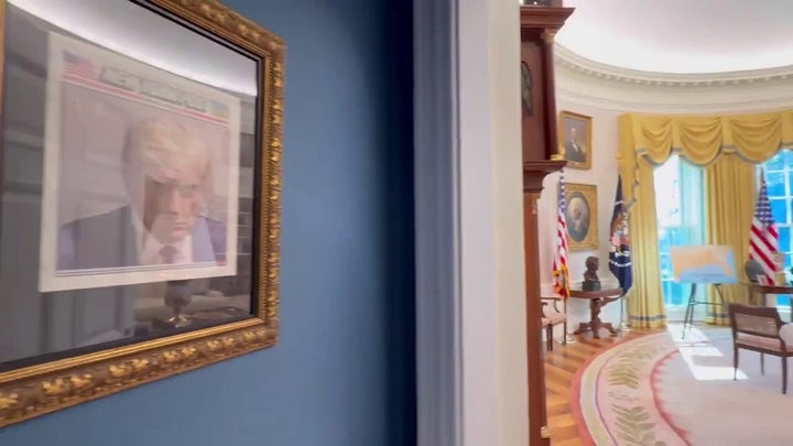 President Trump's mugshot framed near Oval Office