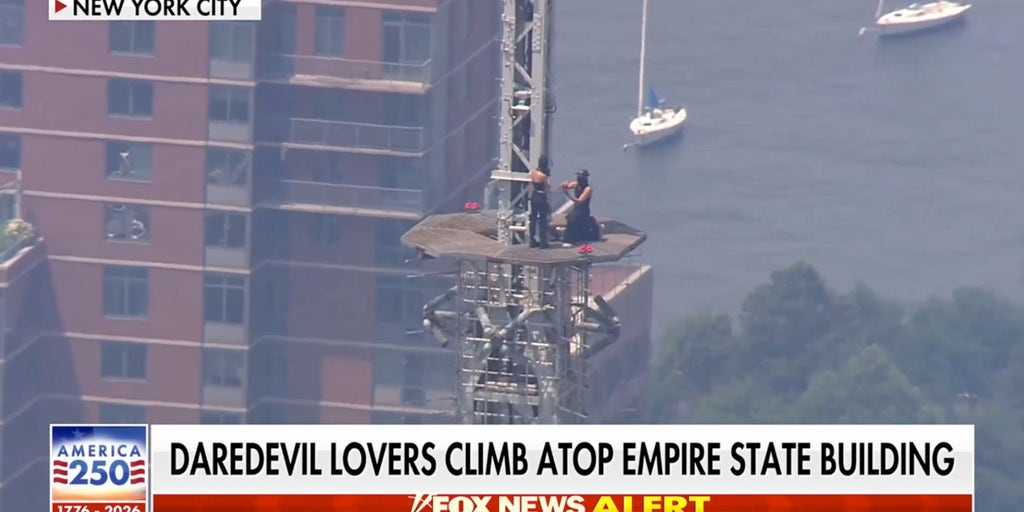 Daredevil couple arrested after scaling Empire State Building spire for proposal