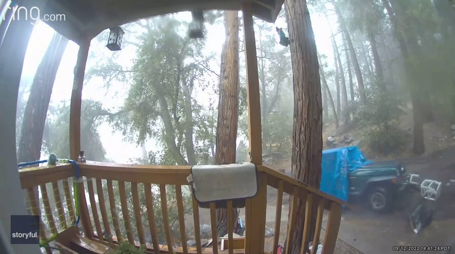 California mudslide sweeps away family's Jeep from driveway