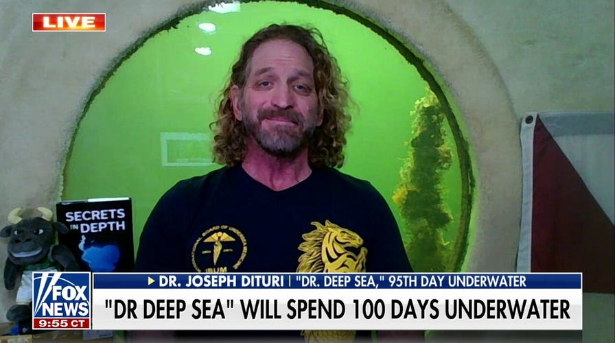 ‘Dr. Deep Sea’ breaks underwater world record