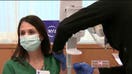 A shot of hope: Frontline health care workers receive first COVID-19 vaccinations