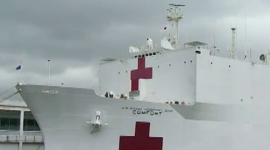 USNS Comfort approved to take COVID-19 patients, as crew member tests positive for the virus