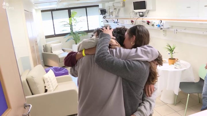 Ofer Kalderon's reunion with his children after 484 days in Hamas captivity. Credit: GPO