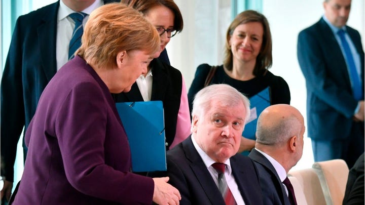 German Chancellor Angela Merkel’s attempted handshake rejected