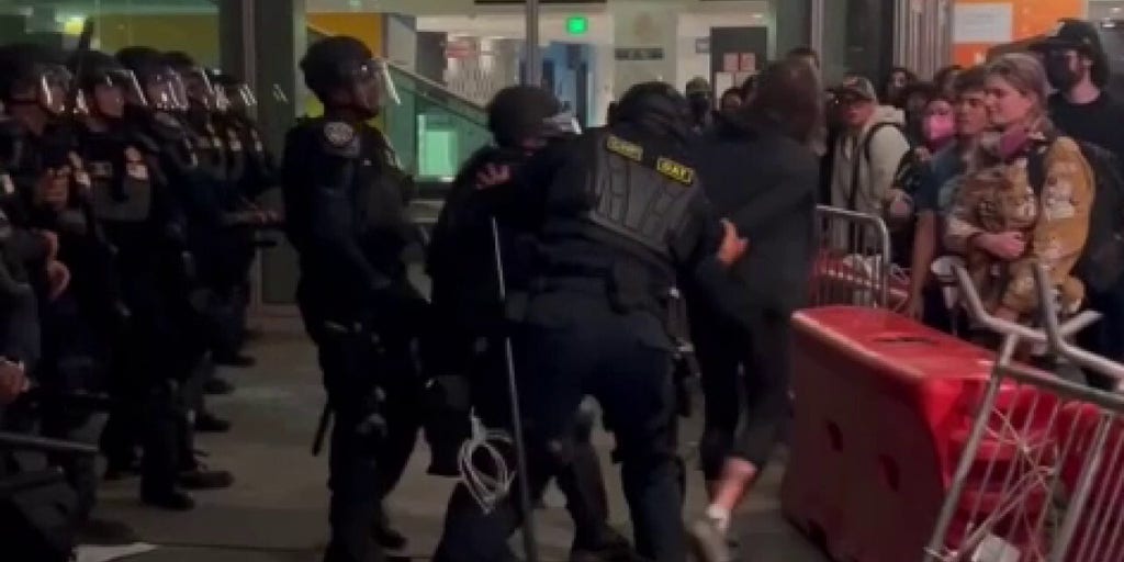 Agitator arrested outside Berkeley TPUSA event after crossing barrier