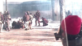 Federal agents deploy tear gas during Minneapolis unrest after Border Patrol-involved shooting